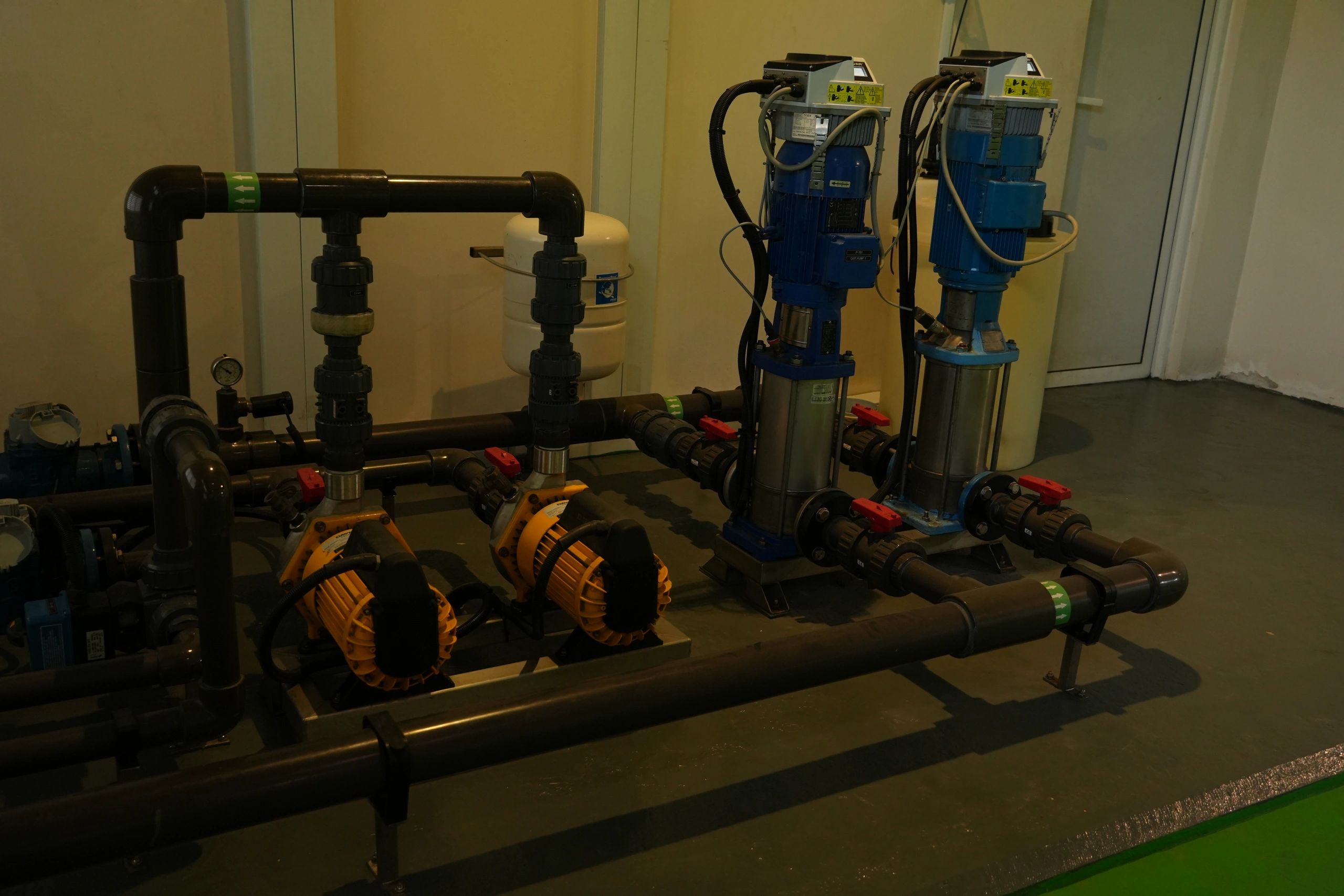 Commercial plumbing installation inside a utility room